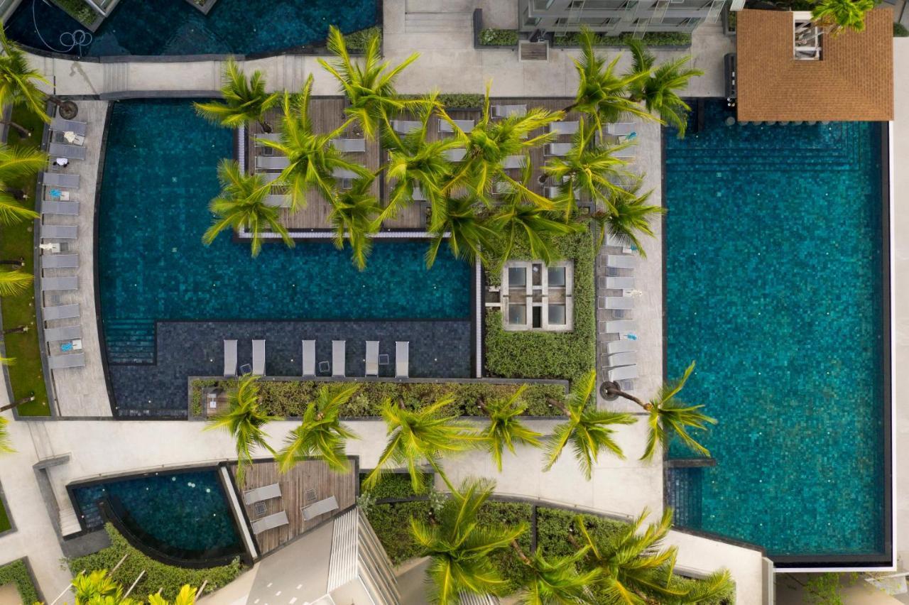 Oceanfront Beach Resort - Sha Extra Plus Patong Екстериор снимка Aerial view of the pool at the hotel