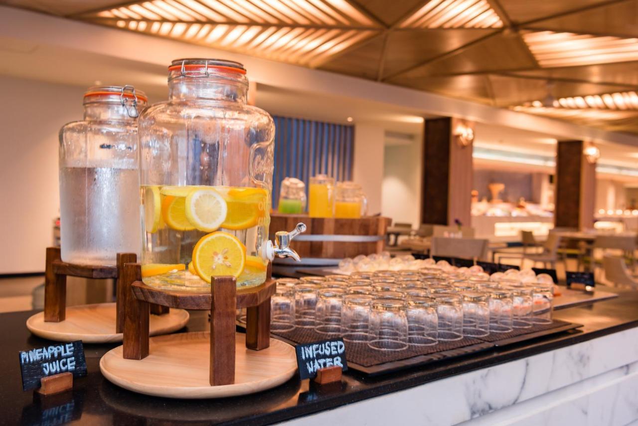 Oceanfront Beach Resort - Sha Extra Plus Patong Екстериор снимка Infused water at a buffet
