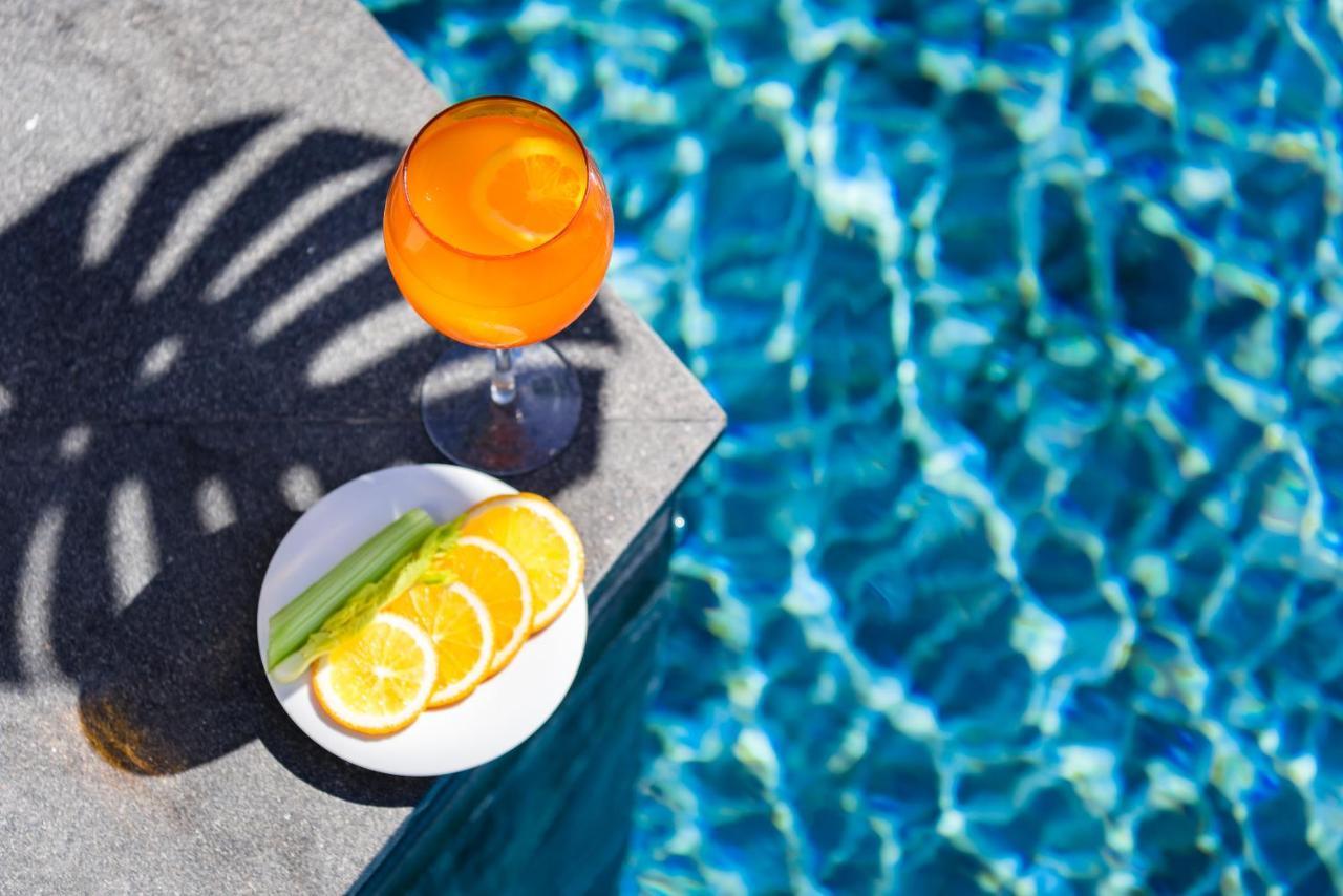Oceanfront Beach Resort - Sha Extra Plus Patong Екстериор снимка A glass of Aperol Spritz